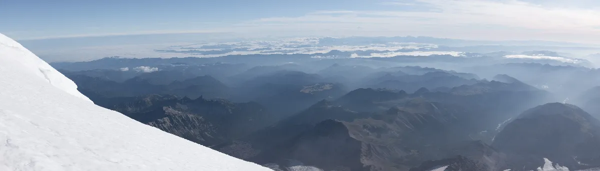 A panoramic view of the ground and view from near summit of Mt Rainier