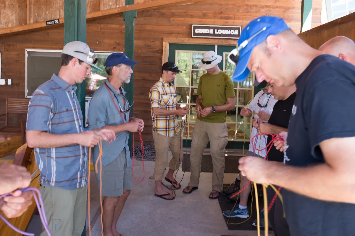 Our team learning critical knots we will use on the climb